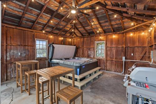 a room with a ping pong table and a mattress at Charming 1932 Craftsman - The Bohannon House in Luray