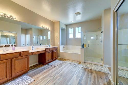 a large bathroom with two sinks and a shower at Updated Gilbert Home with Pool and Community Amenities in Queen Creek