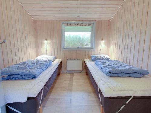 Postel nebo postele na pokoji v ubytování Holiday Home Jutta - 28km from the sea by Interhome