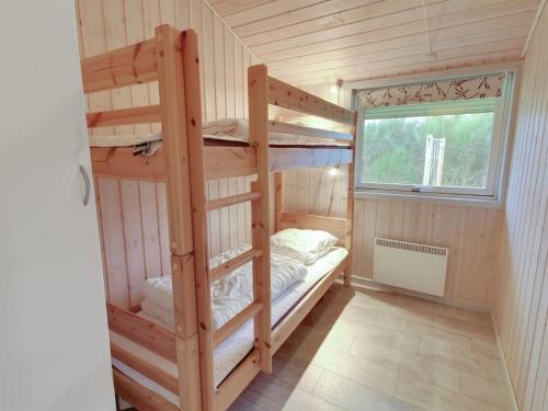 Postel nebo postele na pokoji v ubytování Holiday Home Jutta - 28km from the sea by Interhome