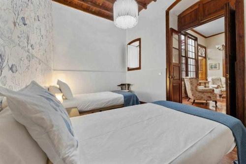 Posteľ alebo postele v izbe v ubytovaní Valls De Quintana Casa Emblemática Arrecife