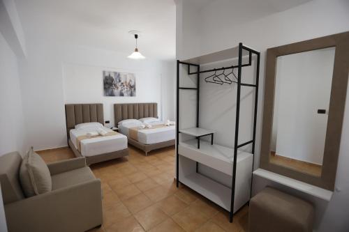 Cama o camas de una habitación en Hotel de Ksamil