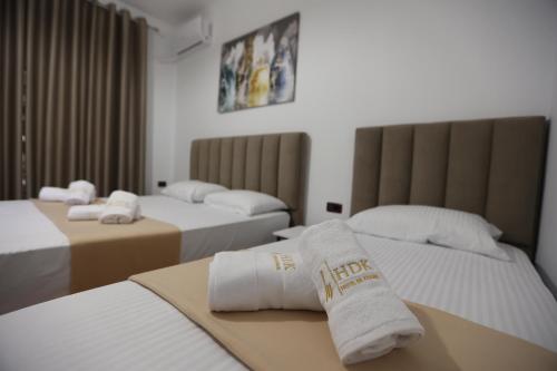 Cama o camas de una habitación en Hotel de Ksamil