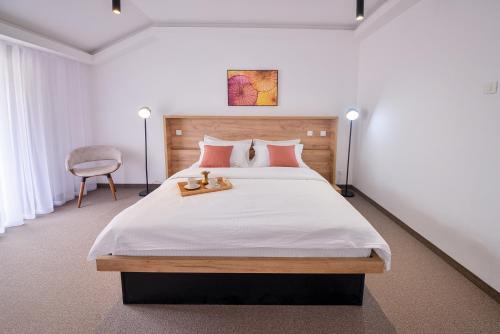 Postel nebo postele na pokoji v ubytování Magnolia Place