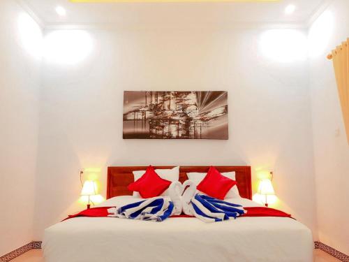 Katil atau katil-katil dalam bilik di Juan Beach Bungalow