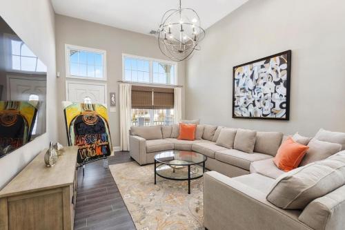 a living room with a couch and a table at Balcony View, Updated Interior, Close to the Beach! in Atlantic City