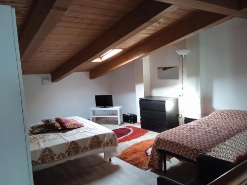 Ένα ή περισσότερα κρεβάτια σε δωμάτιο στο Casalborsetti Porto Reno