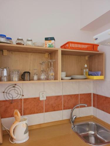Kuchyň nebo kuchyňský kout v ubytování Apartmány Brno