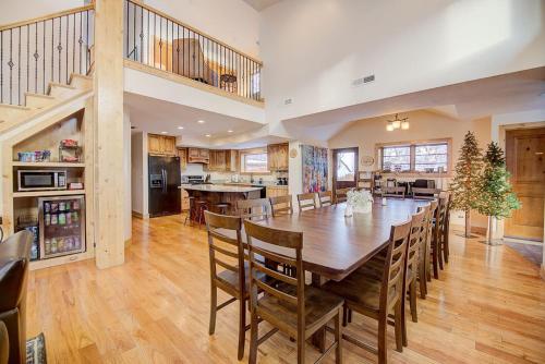 a dining room and kitchen with a large table and chairs at Engen Hus Bed and Breakfast in Salt Lake City