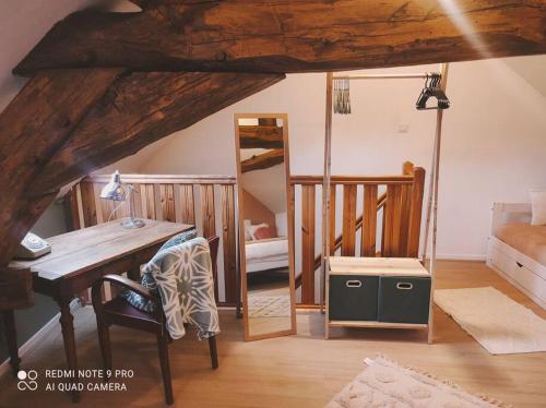 Cama o camas de una habitación en Le gîte "La belle époque" classé 3 Etoiles