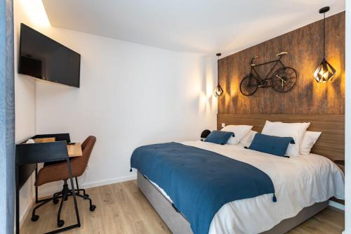 Ένα ή περισσότερα κρεβάτια σε δωμάτιο στο Marinha Grande Apartamentos N4 FACTORY