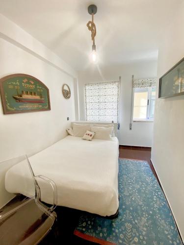 Postel nebo postele na pokoji v ubytování A Berlenga 3