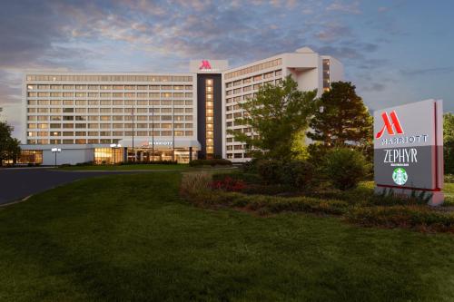 a view of a hotel with a sign in front of it at Marriott Kansas City Overland Park in Overland Park