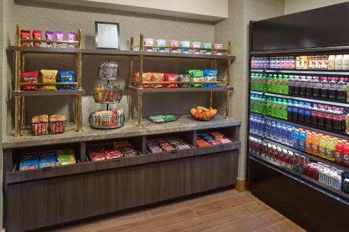 a grocery store aisle with food and drinks at Marriott Kansas City Overland Park in Overland Park