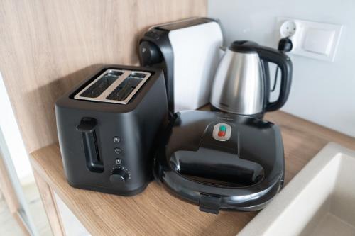a black blender sitting on top of a counter at Konik Morski in Jastarnia