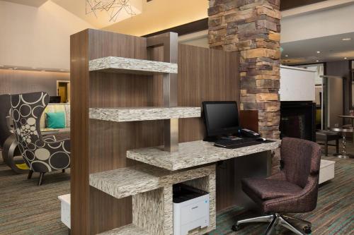 an office with a desk with a computer and a chair at Residence Inn by Marriott Las Vegas Airport in Las Vegas