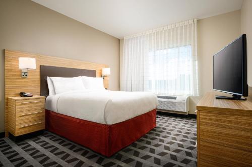 Кровать или кровати в номере TownePlace Suites by Marriott Tuscaloosa