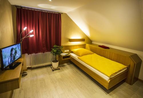 
Ein Bett oder Betten in einem Zimmer der Unterkunft Boardinghouse Remchingen Baan Arun
