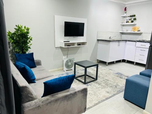 Η κουζίνα ή μικρή κουζίνα στο Reros Apartments in Mankweng