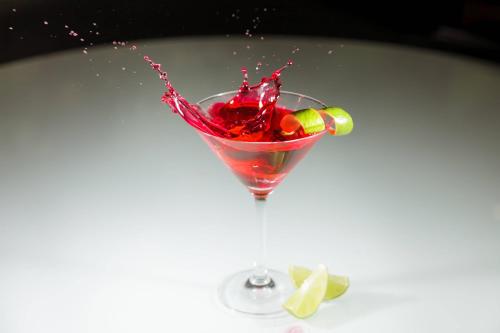 a drink in a martini glass on a table at Sheraton Essen Hotel in Essen