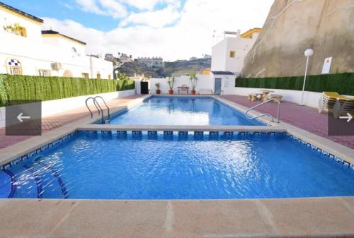 The swimming pool at or close to Beautiful apartment at La Marquesa Golf Quesada