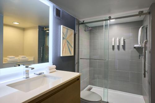 a bathroom with a sink and a shower at Marriott Columbia in Columbia