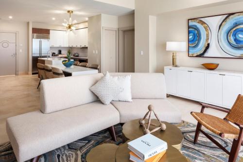 a living room with a couch and a table at The Residences at The St. Regis Bermuda in Saint George