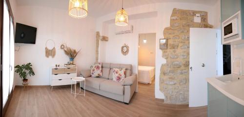 Χώρος καθιστικού στο Apartamentos turísticos La Estación