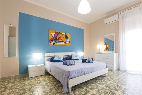 A bed or beds in a room at La Casa di Annale'