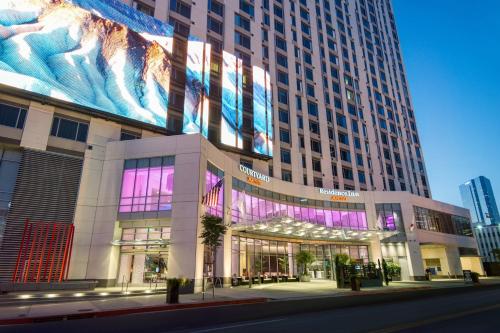 a large building with a painting on the side of it at Courtyard by Marriott Los Angeles L.A. LIVE in Los Angeles