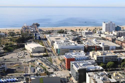 an aerial view of a city and the beach at Courtyard by Marriott Santa Monica in Los Angeles
