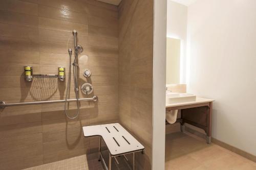 a bathroom with a shower and a sink at Element Ontario Rancho Cucamonga in Ontario