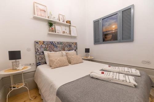 Postel nebo postele na pokoji v ubytování Porto Contemporary Apartment in city center