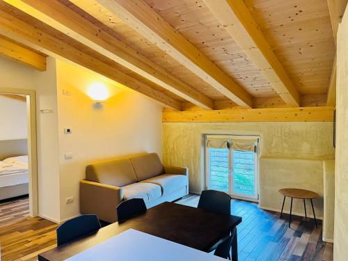 A bed or beds in a room at Albola Suite Holiday Apartments