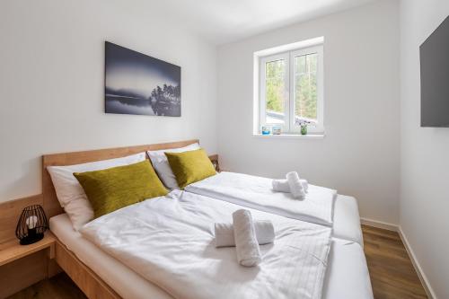 Posteľ alebo postele v izbe v ubytovaní Deluxe Apartment Lipno - Lake Side Village, Frymburk nad Vltavou