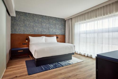 Kama o mga kama sa kuwarto sa Residence Inn by Marriott Strasbourg