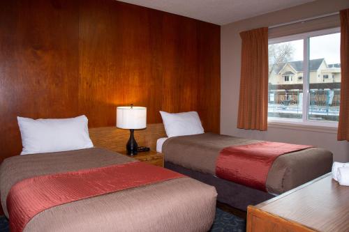 Bowmont Motelにあるベッド