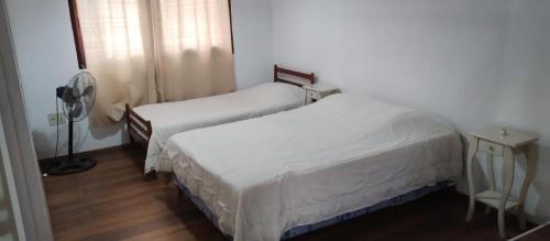 Cama o camas de una habitación en Casa en colonia para 7 personas