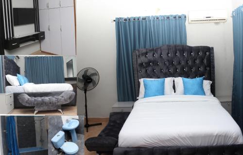 1 dormitorio con 1 cama grande y 1 silla en Laribond's Place en Lagos