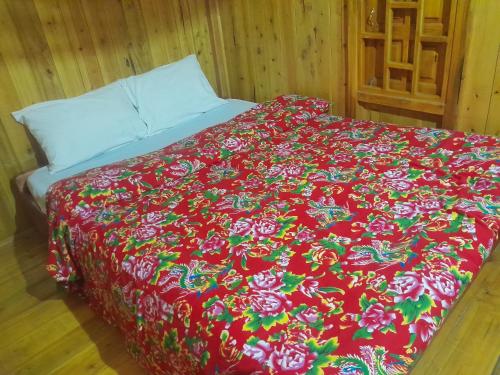 Giường trong phòng chung tại tee Homestay hmong