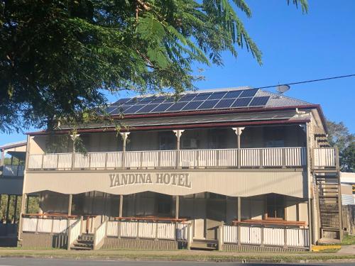 a building with solar panels on the roof at Yandina Hotel in Yandina
