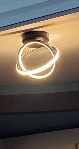 a light fixture on the ceiling of a building at RH/Los angeles (#1) front of airport in San Juan