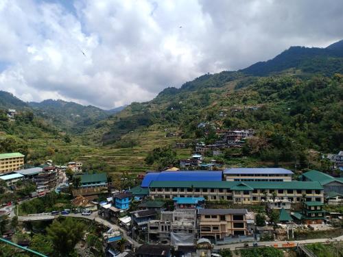 an aerial view of a town in a mountain at Koreen Guest House in Banaue