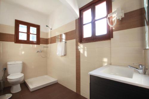 Ett badrum på Traditional Apartments Alexandra