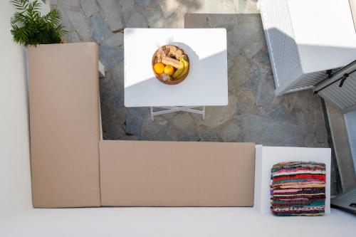 an overhead view of a bowl of bananas in a box at SUNSET220 spetses in Spetses