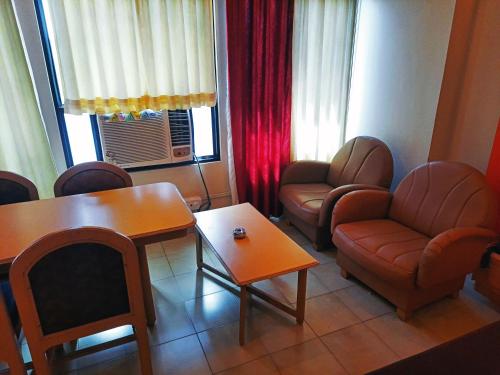 Posezení v ubytování Sanman Deluxe Lodge
