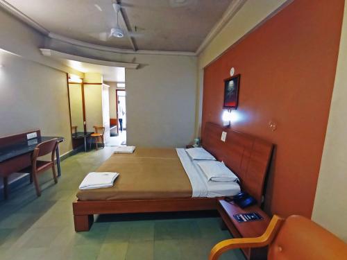 TV a/nebo společenská místnost v ubytování Sanman Deluxe Lodge