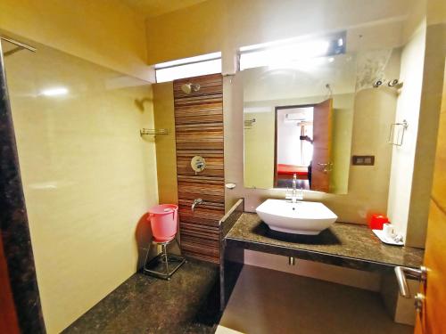 Koupelna v ubytování Sanman Deluxe Lodge