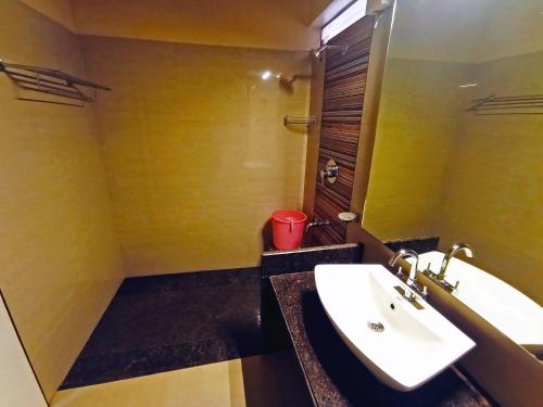 Koupelna v ubytování Sanman Deluxe Lodge