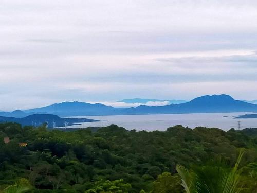 a view of a body of water with mountains at a CABIN MOUNTAIN PEAK in Sampalok